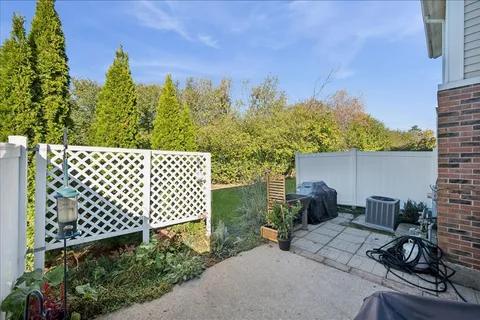 a backyard of a house with lots of green space