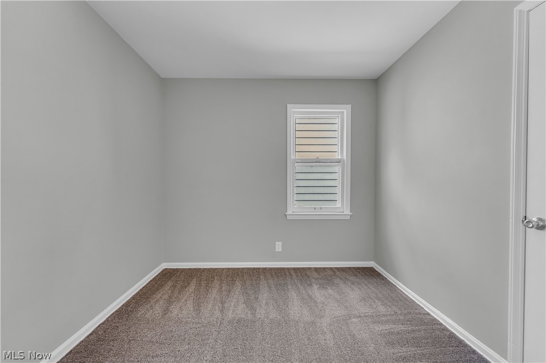 1828 South Green Road Cleveland, OH 44121 - Photo 14 of 30 View of carpeted empty room