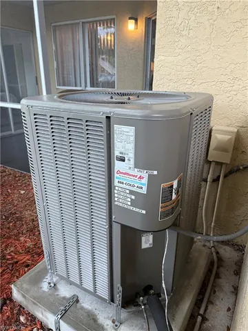 a view of a patio with table and chairs and potted plants