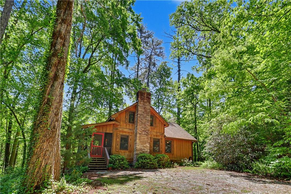 102 Moses Road Rabun Gap, GA 30568 - Photo 3 of 40 a house view with a outdoor space