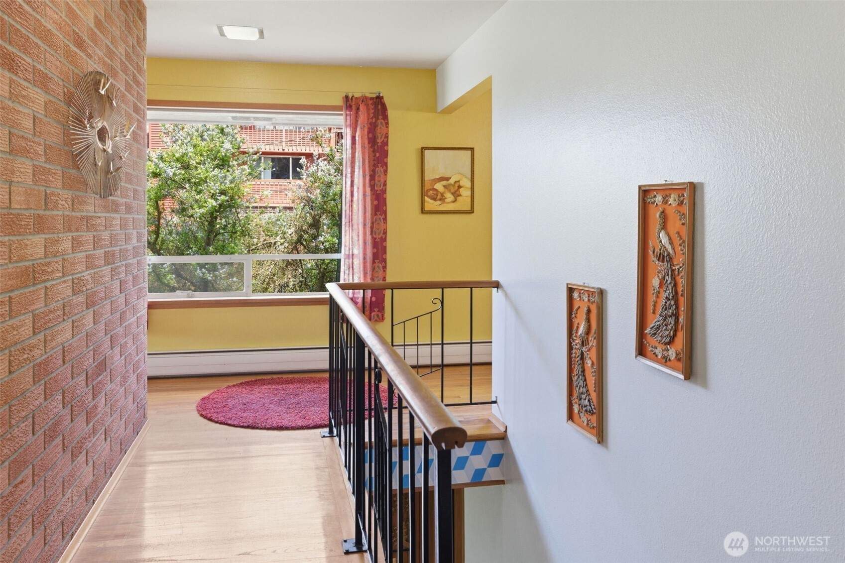 2803 South Walker Street Seattle, WA 98144 - Photo 30 of 40 a view of a hardwood & staircase