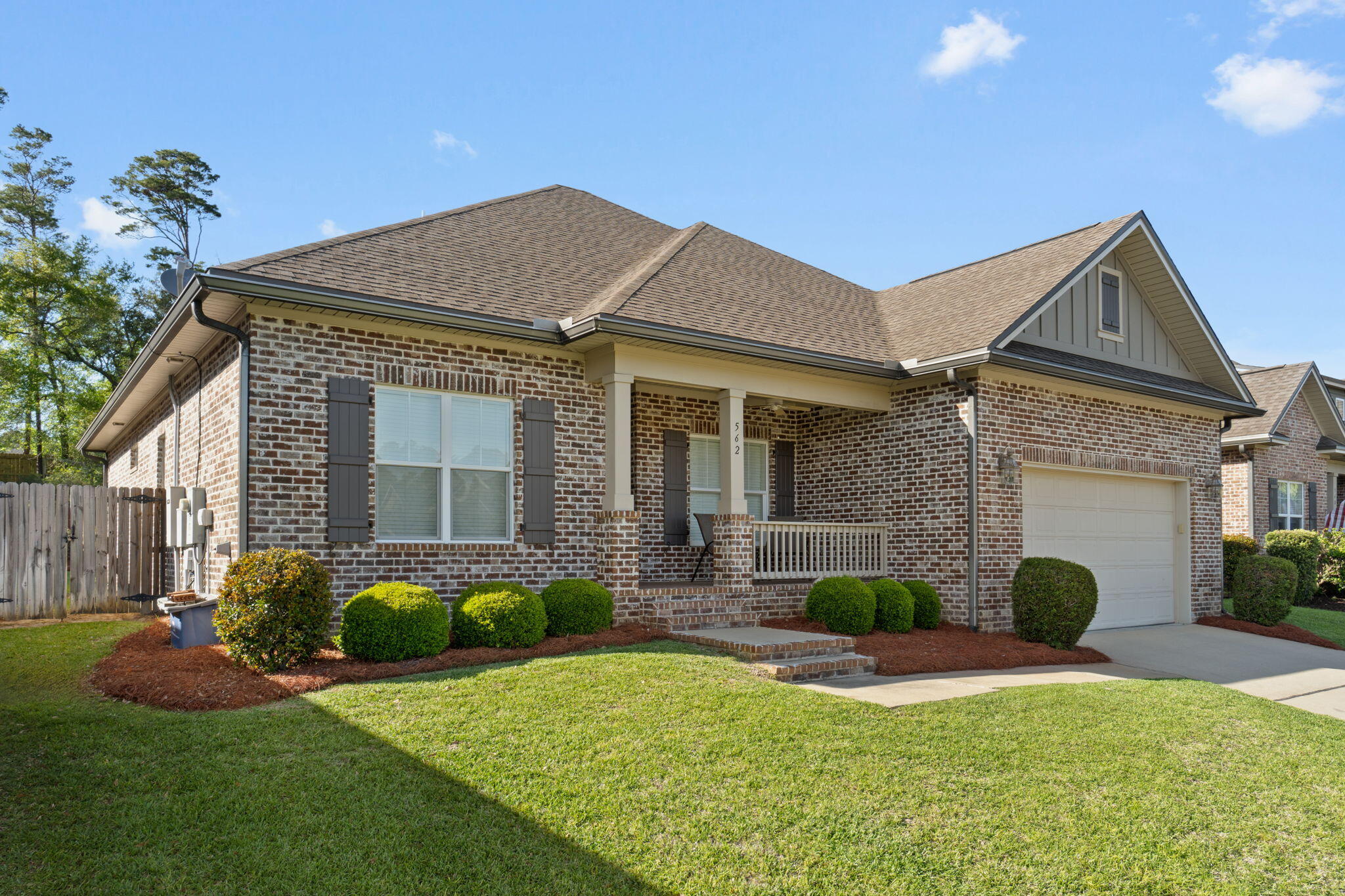 562 Falcon Trail Niceville, FL 32578 - Photo 2 of 40 a view of a house with a yard and plants