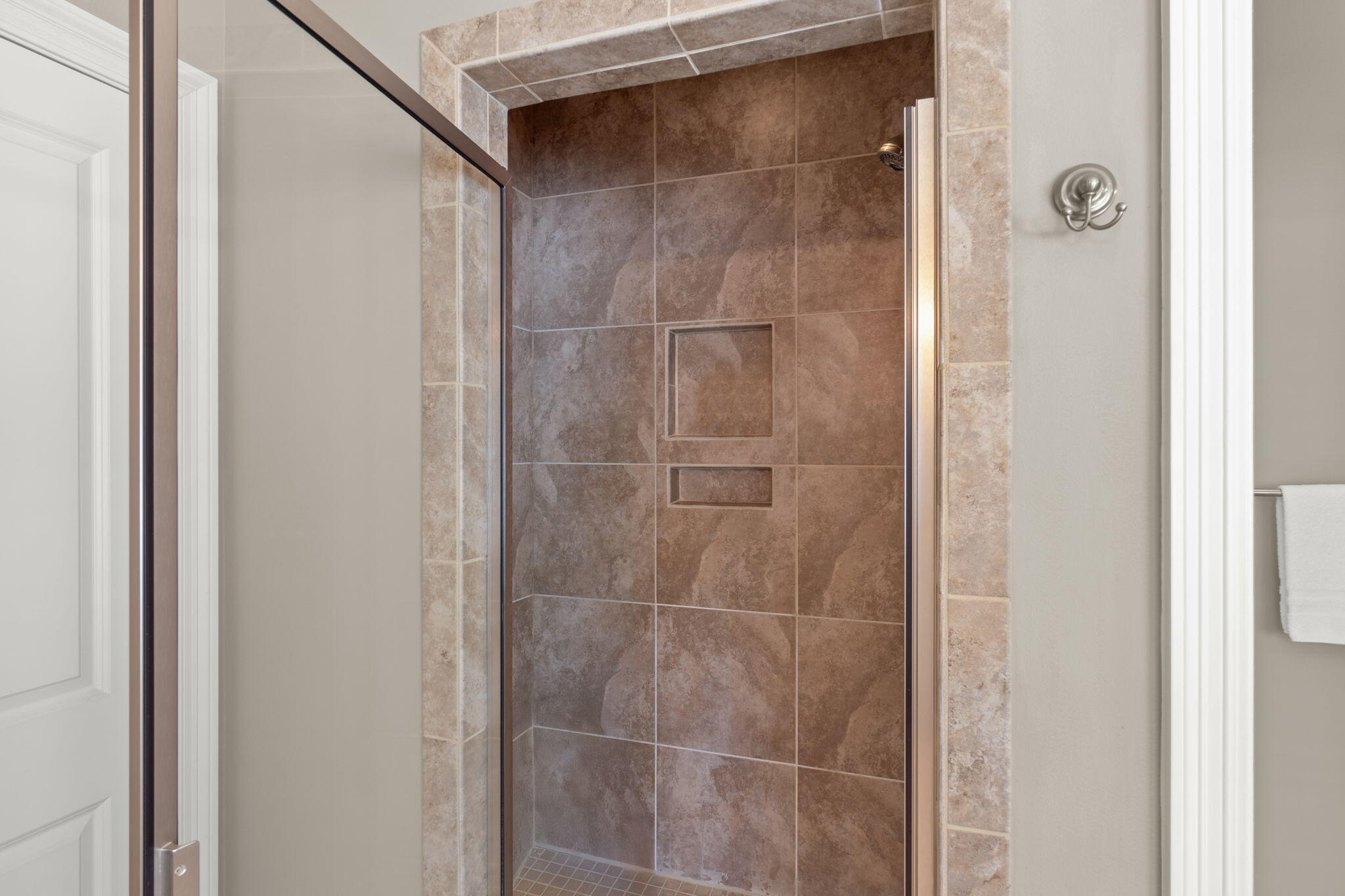 562 Falcon Trail Niceville, FL 32578 - Photo 28 of 40 a bathroom with a glass shower door