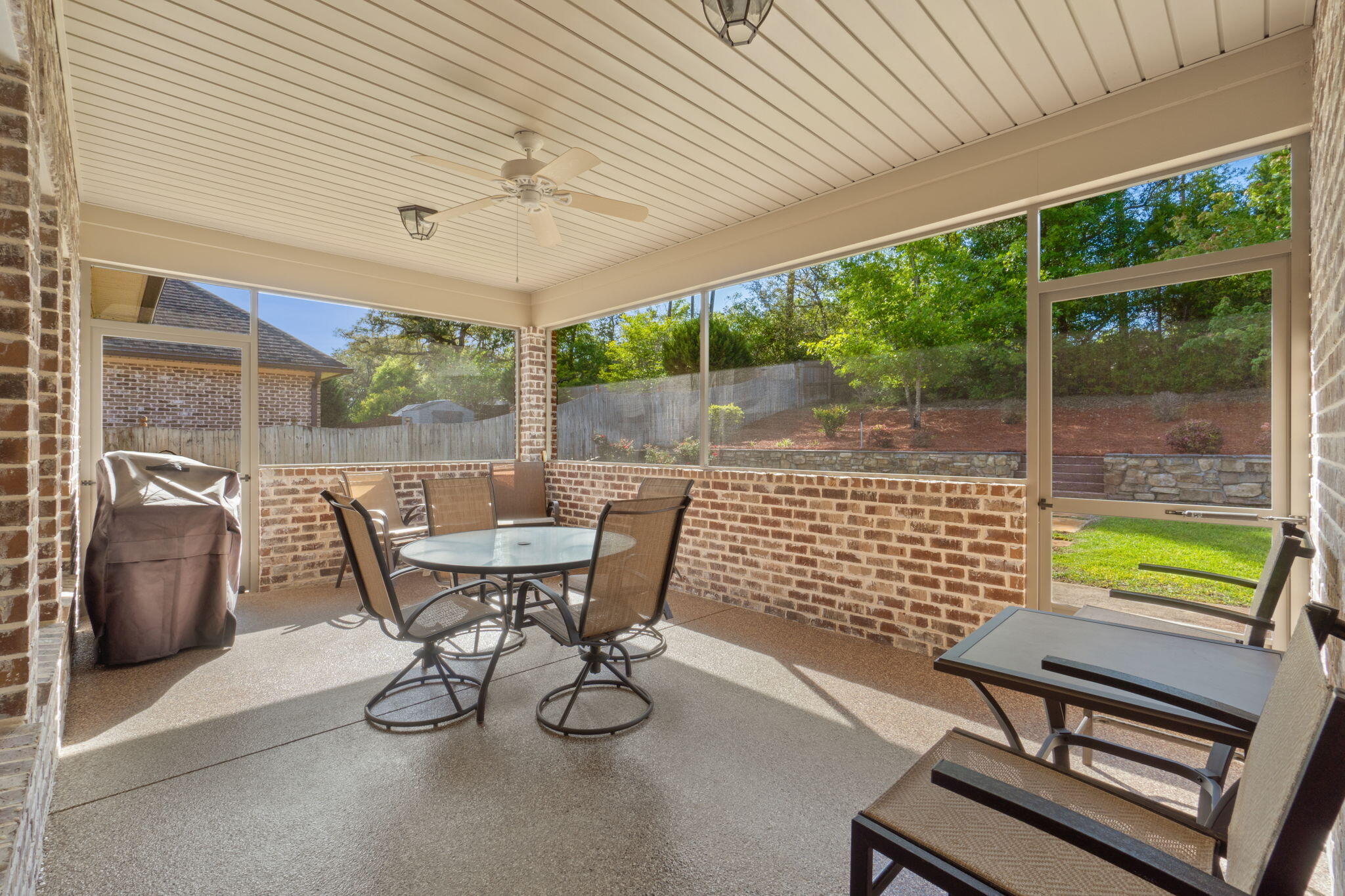 562 Falcon Trail Niceville, FL 32578 - Photo 30 of 40 a view of a patio with table and chairs