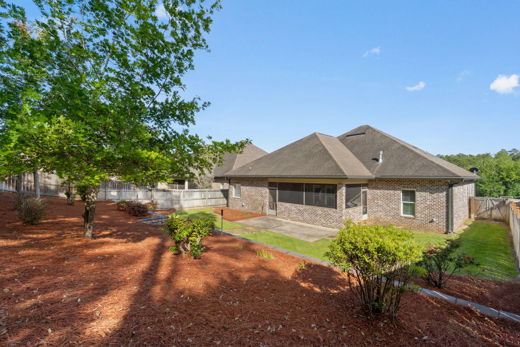 562 Falcon Trail Niceville, FL 32578 - Photo 33 of 40 a front view of a house with garden