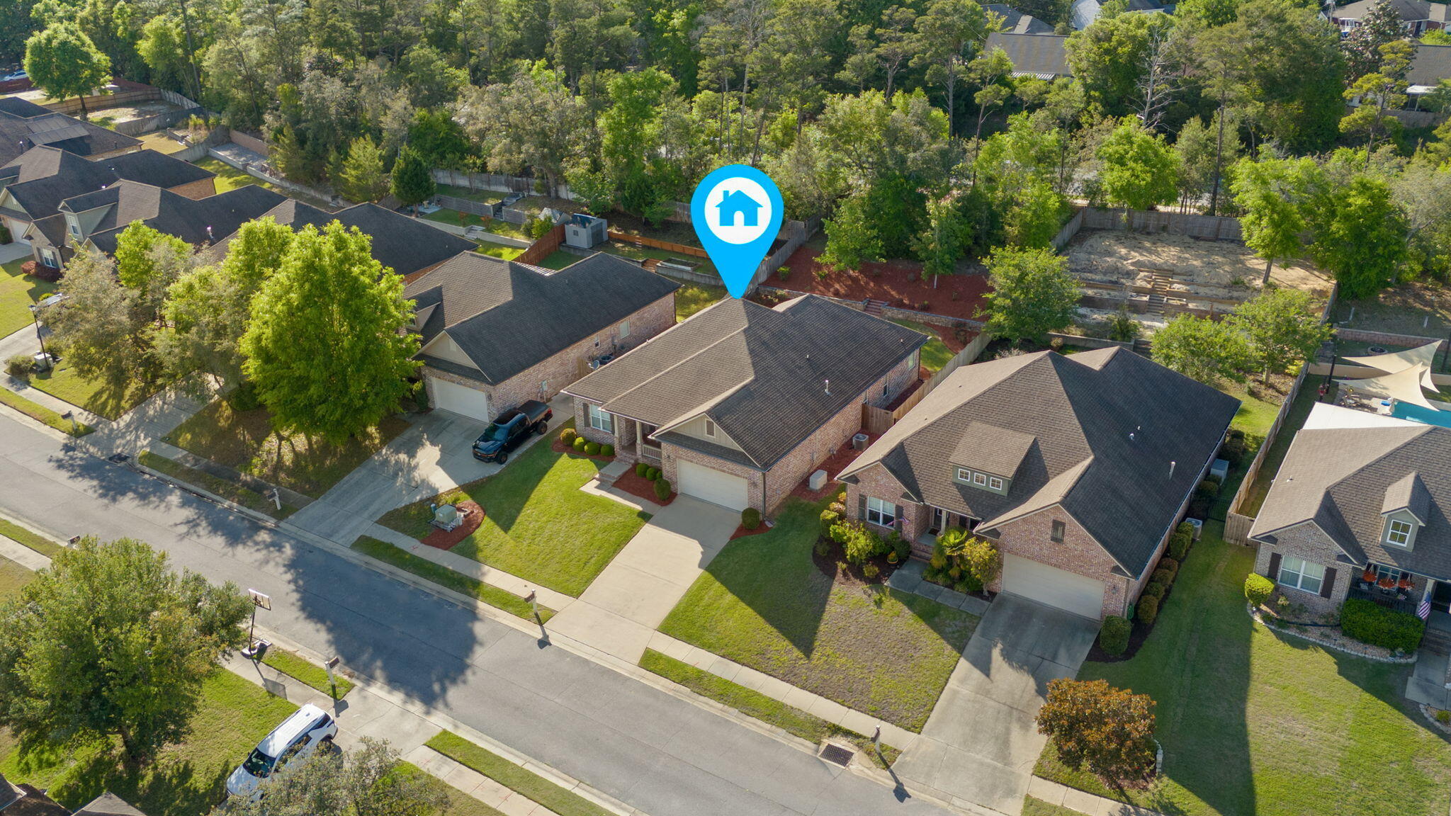 562 Falcon Trail Niceville, FL 32578 - Photo 34 of 40 an aerial view of a house with swimming pool and outdoor seating