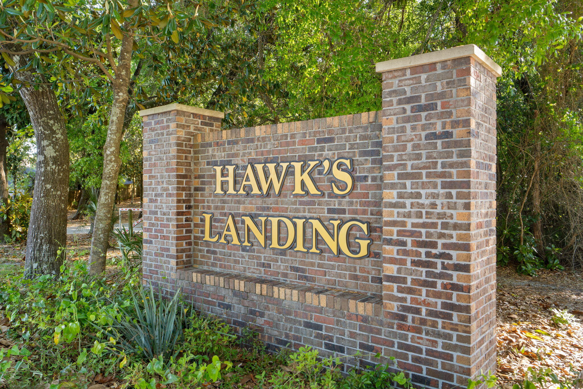562 Falcon Trail Niceville, FL 32578 - Photo 40 of 40 a sign that is on a pole