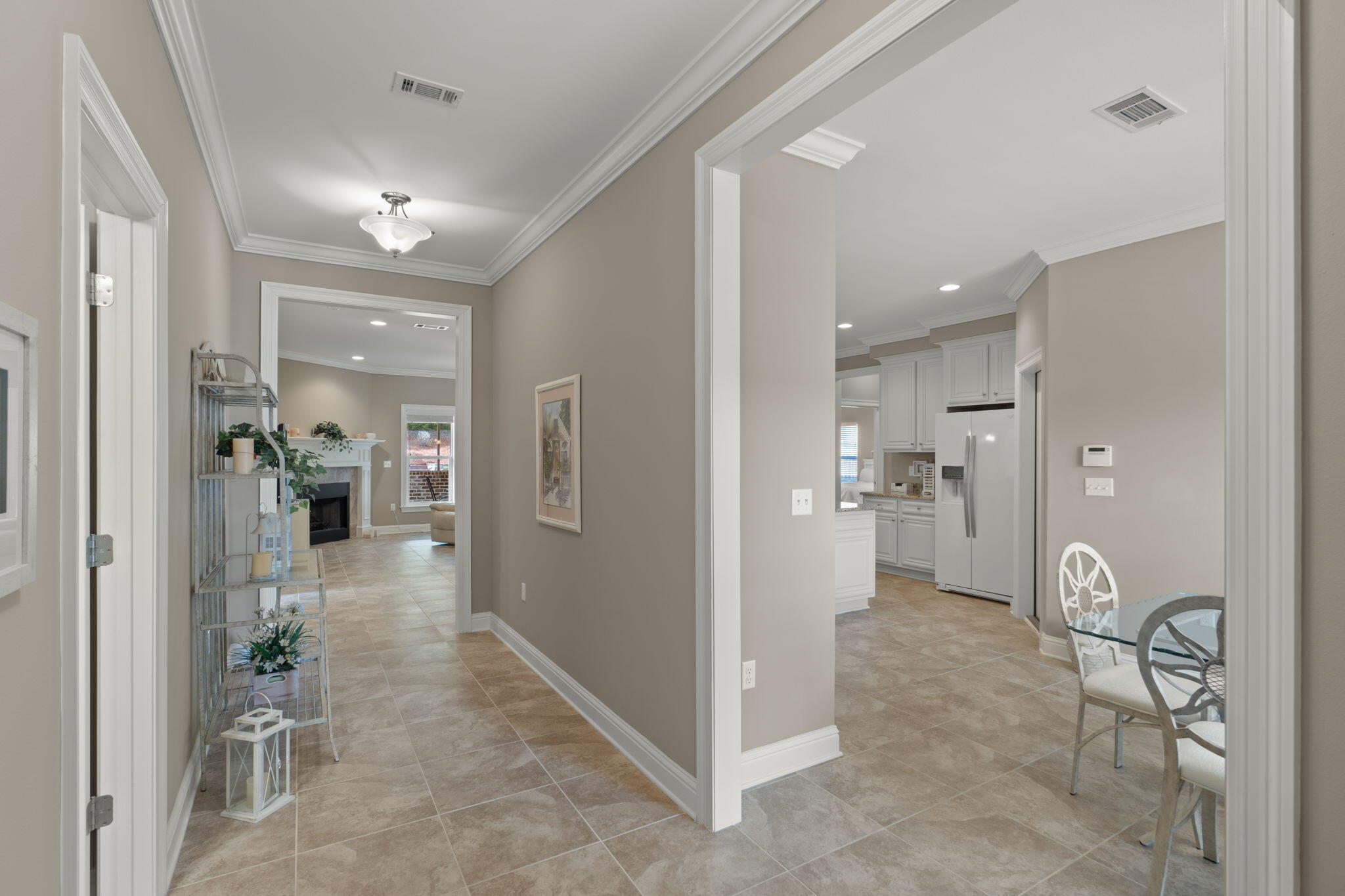 562 Falcon Trail Niceville, FL 32578 - Photo 5 of 40 a view of a hallway with dining area and living room view