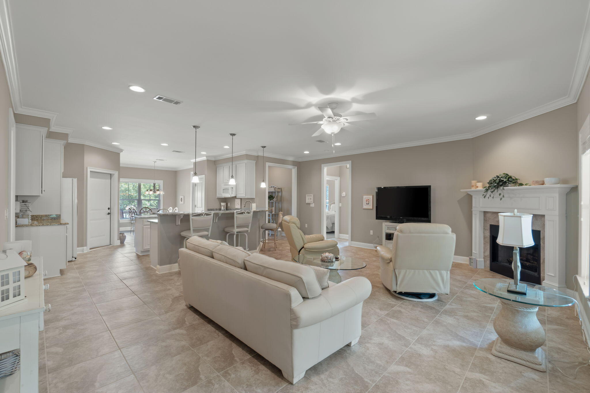 562 Falcon Trail Niceville, FL 32578 - Photo 7 of 40 a living room with furniture and a flat screen tv