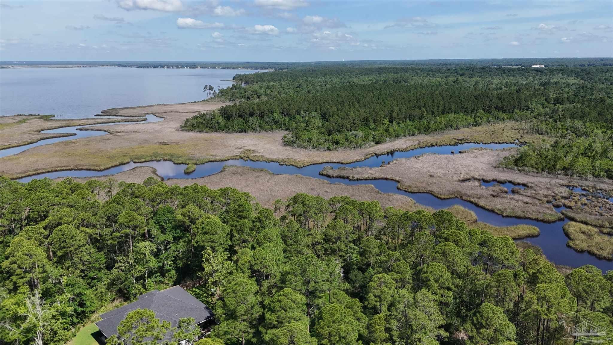 Lot 7 Sunset Bayou Drive Milton, FL 32583 - Photo 8 of 19 an aerial view of a houses with outdoor space