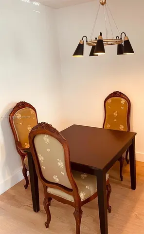 a balcony with table and workspace