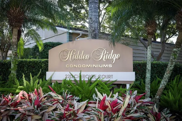 a sign that is on a brick wall