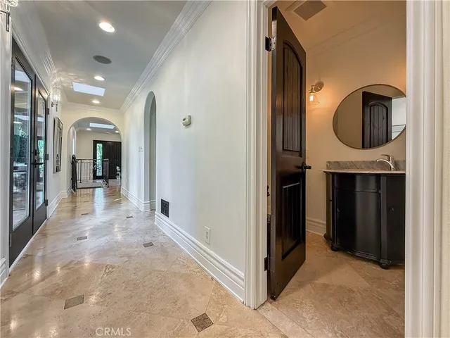 a kitchen with granite countertop a stove and a microwave
