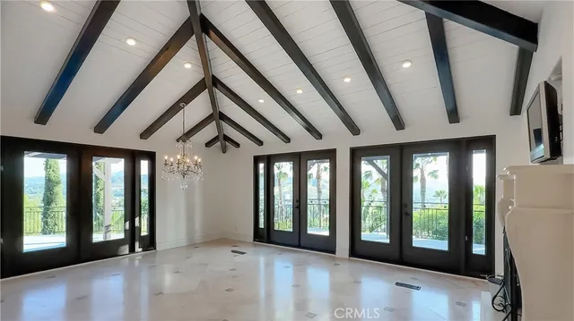 a spacious bathroom with a granite countertop sink mirror vanity and toilet