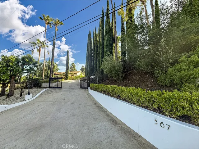 a front view of a house with yard