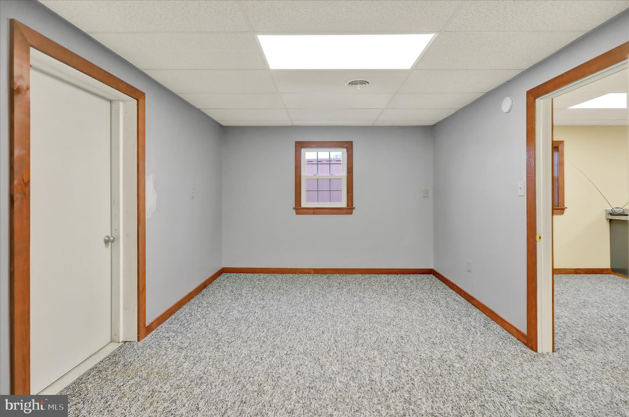392 5 Locks Road Shoemakersville, PA 19555 - Photo 6 of 11 an empty room with windows and closet