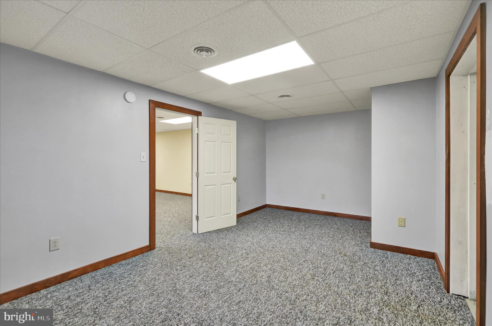 392 5 Locks Road Shoemakersville, PA 19555 - Photo 7 of 11 an empty room with a natural light