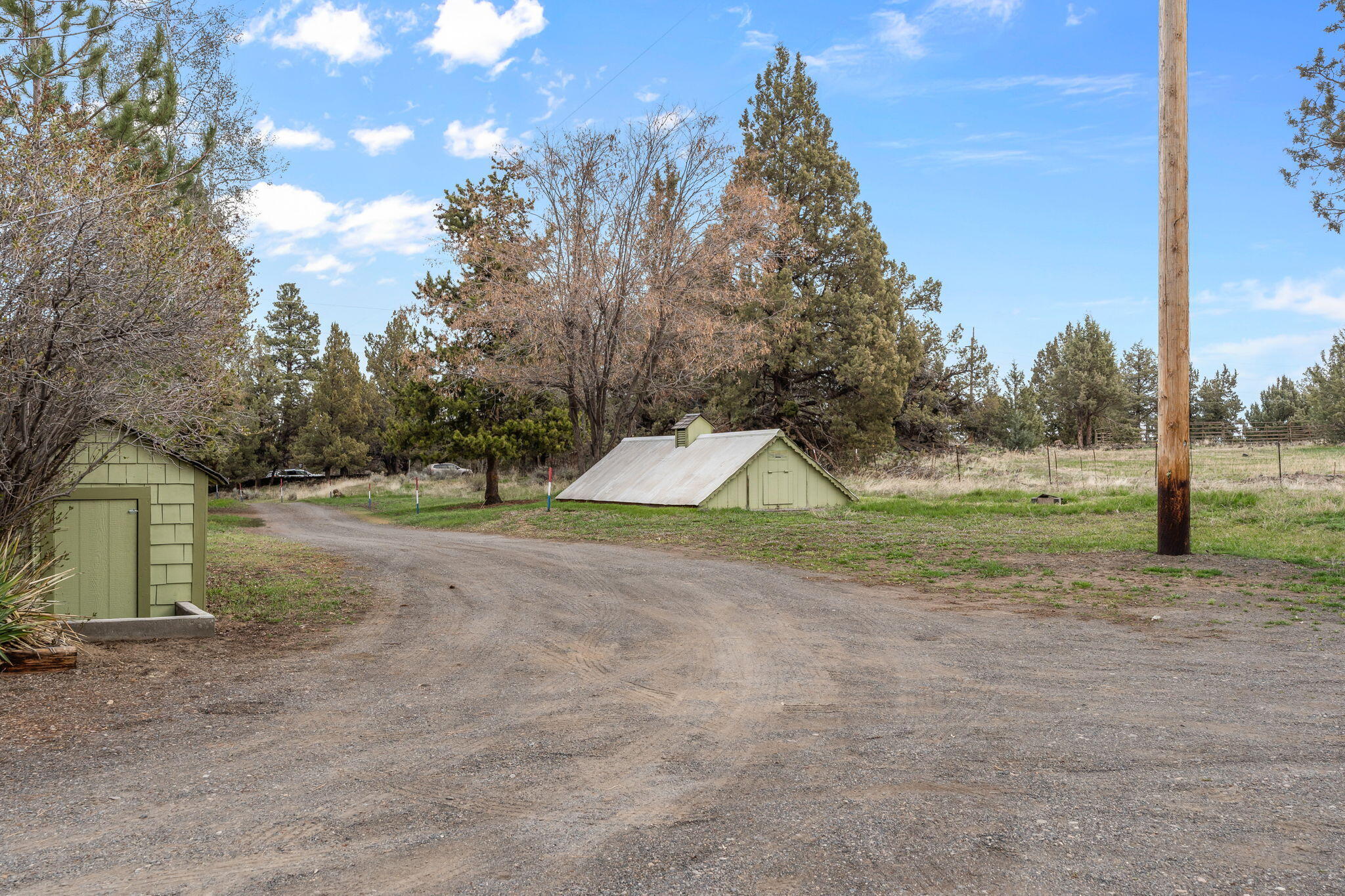 22655 Alfalfa Market Road Bend, OR 97701 - Photo 50 of 58 Pump House to the left and covered irrigation Cistern to the right