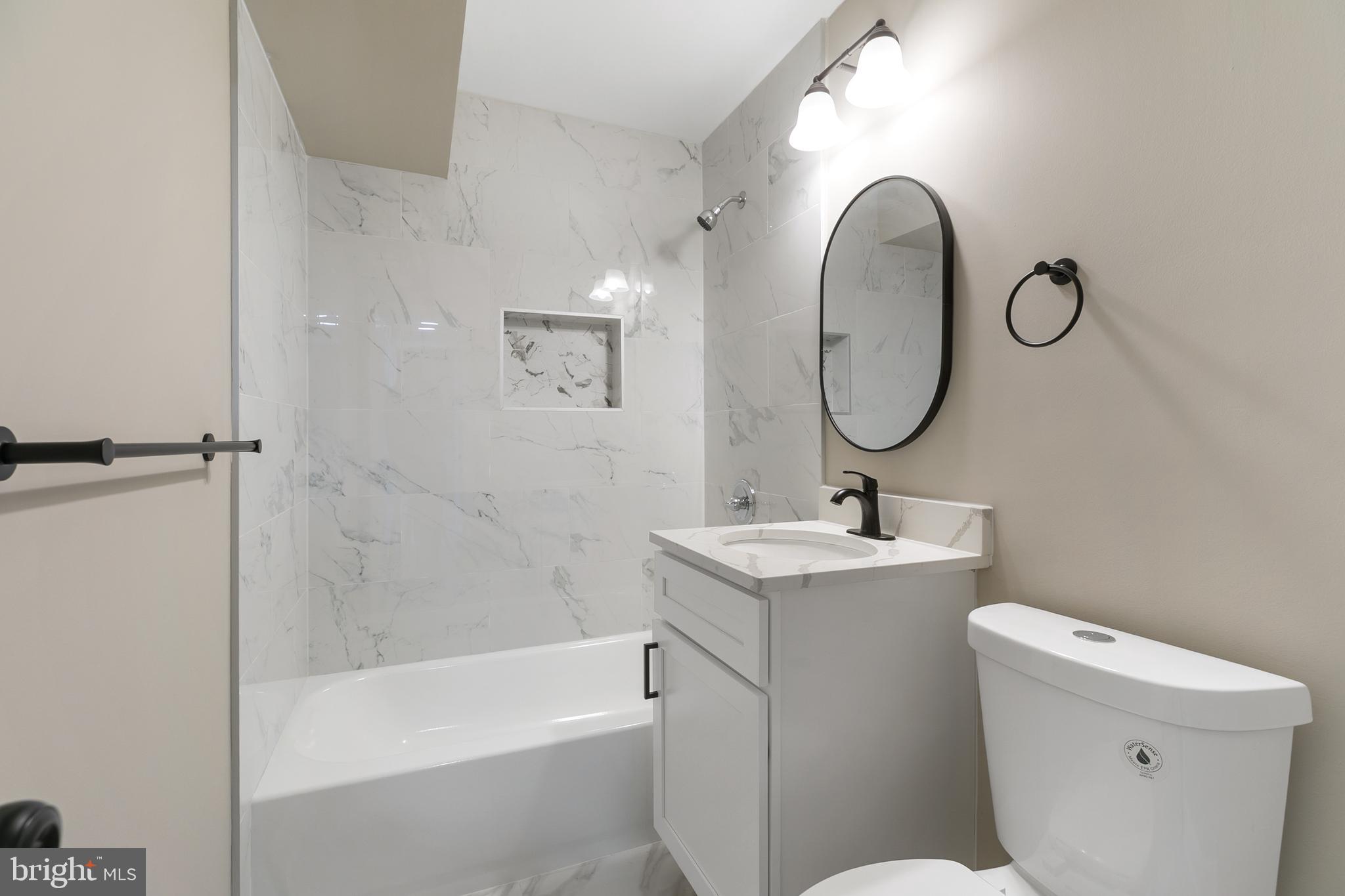 8 Control Court Middle River, MD 21220 - Photo 14 of 24 a bathroom with a sink toilet and a mirror