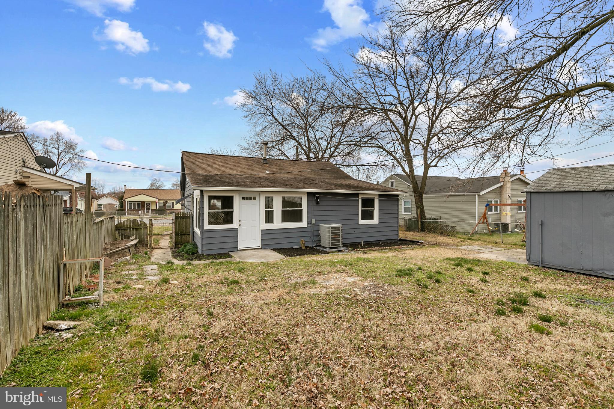 8 Control Court Middle River, MD 21220 - Photo 22 of 24 a view of a yard in front of a house with large tree