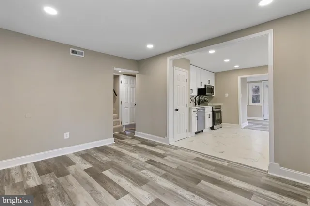 a view of a kitchen with a sink