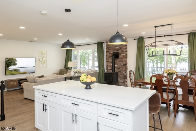 11 Washington Street Landing, NJ 07850 - Photo 11 of 45 a kitchen with a sink a center island and living room view