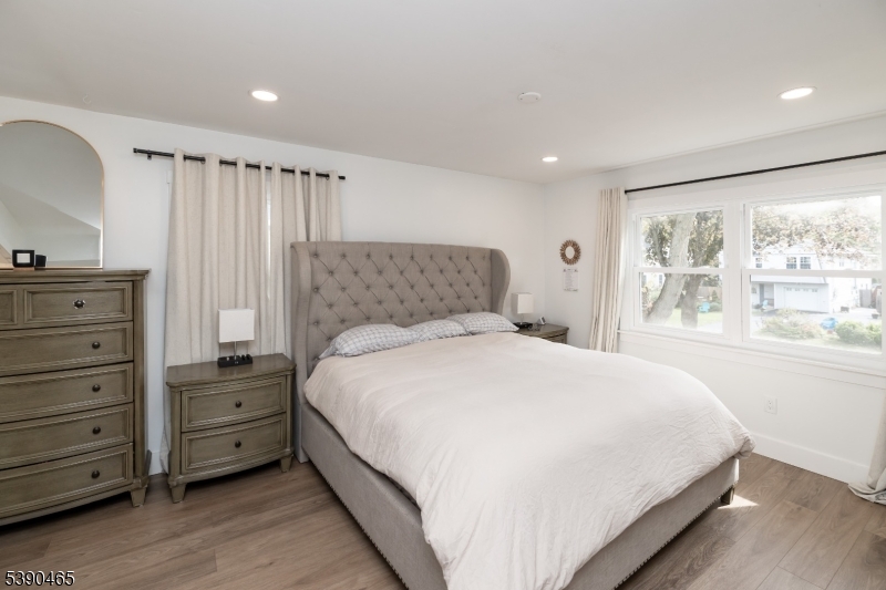 11 Washington Street Landing, NJ 07850 - Photo 16 of 45 a bedroom with a large bed and a window