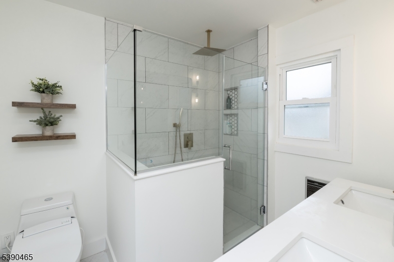 11 Washington Street Landing, NJ 07850 - Photo 21 of 45 a bathroom with a shower a toilet and a sink