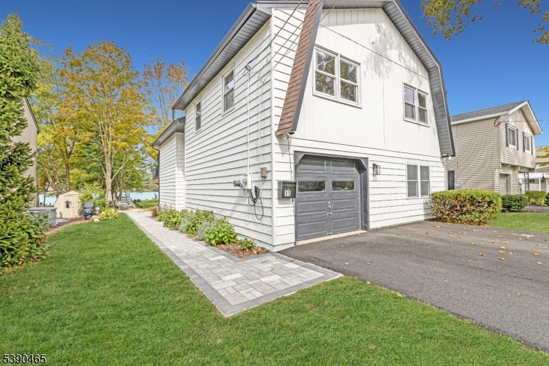 11 Washington Street Landing, NJ 07850 - Photo 40 of 45 a front view of a house with garden