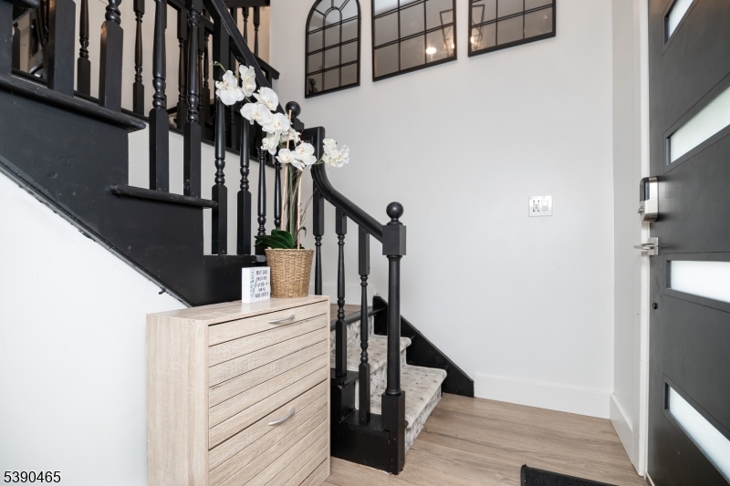 11 Washington Street Landing, NJ 07850 - Photo 5 of 45 a view of entryway and hall with wooden floor