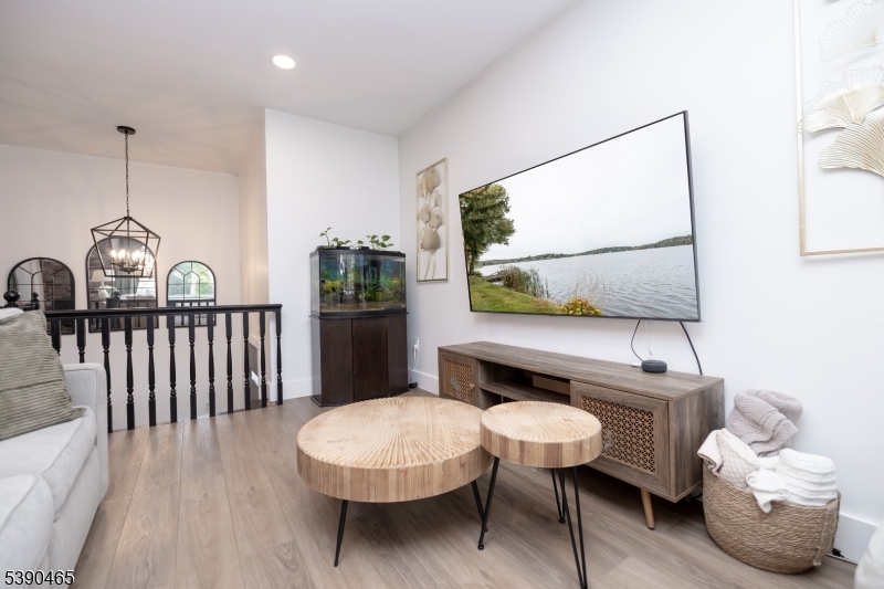 11 Washington Street Landing, NJ 07850 - Photo 8 of 45 a living room with a couch and a table