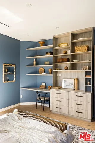 a view of swimming pool with a chair