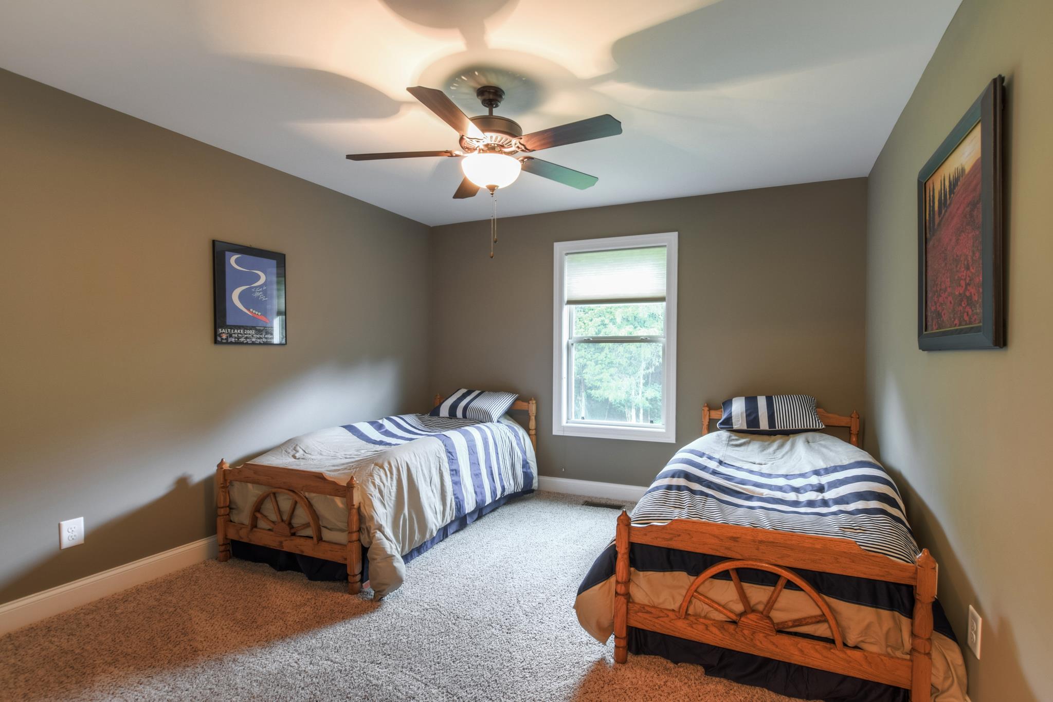 158 Abbey Road Lebanon, TN 37090 - Photo 14 of 30 a bedroom with two beds and a chandelier