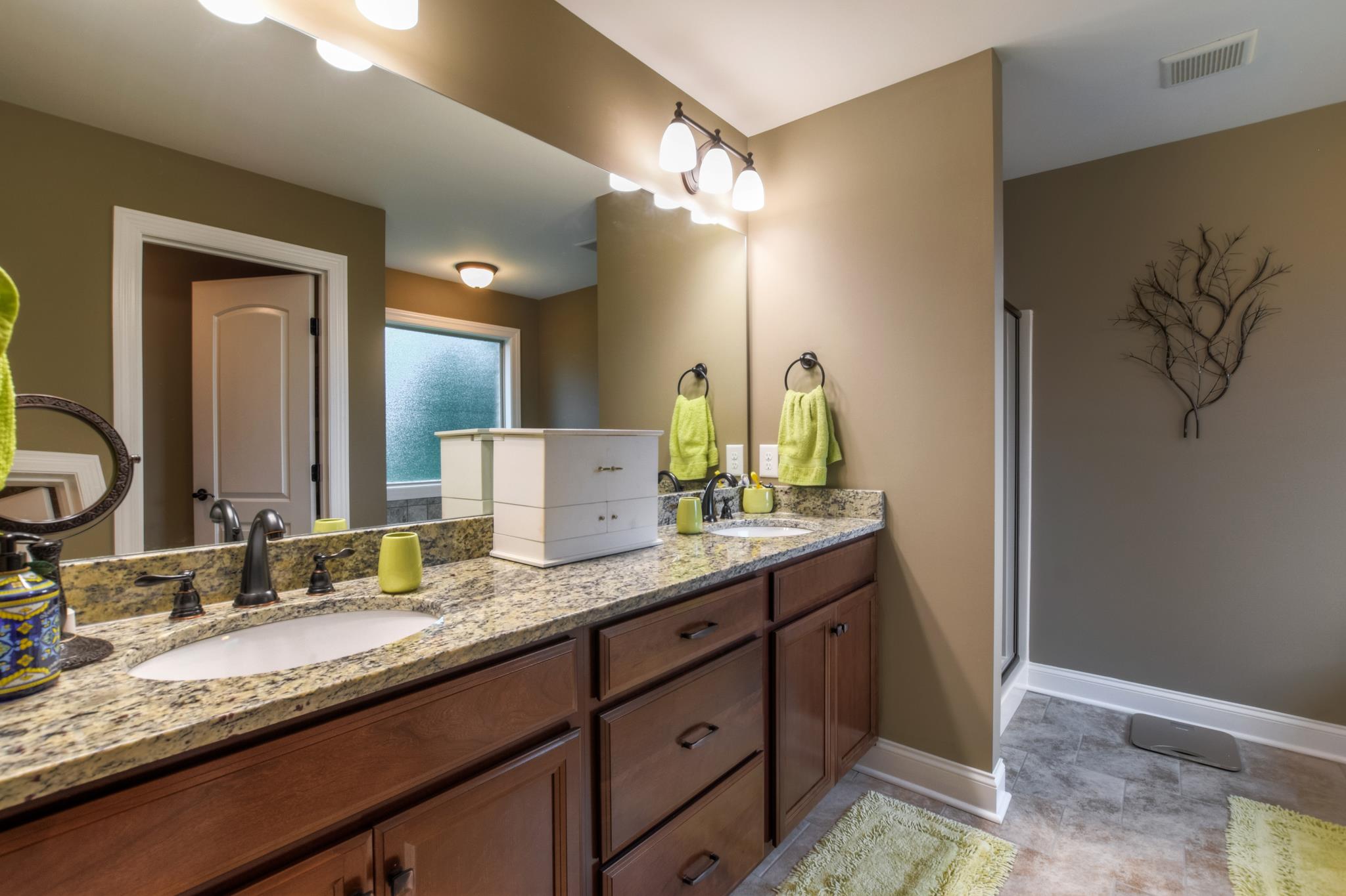 158 Abbey Road Lebanon, TN 37090 - Photo 17 of 30 a bathroom with a granite countertop sink and a mirror