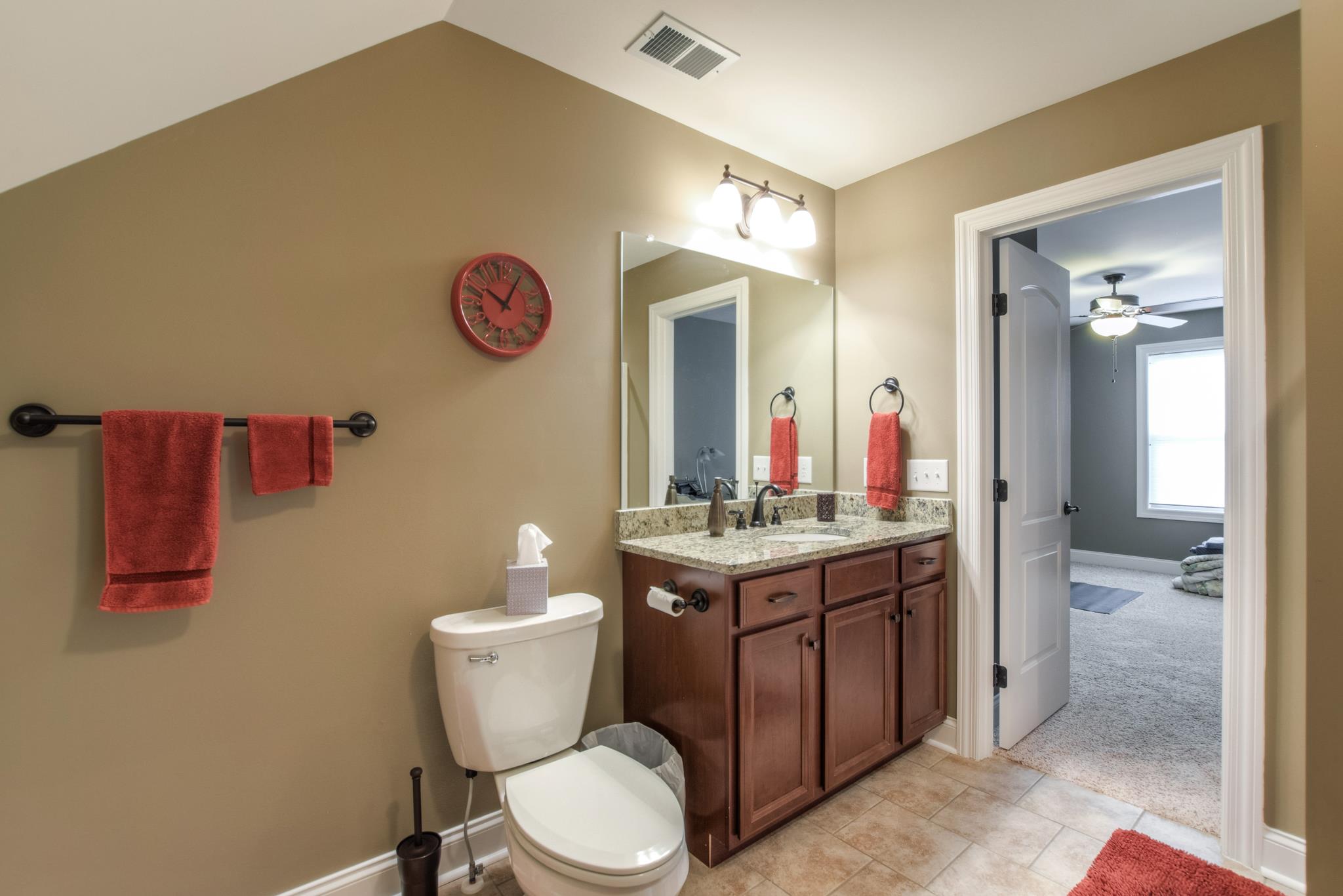 158 Abbey Road Lebanon, TN 37090 - Photo 25 of 30 a bathroom with a toilet a sink and a mirror