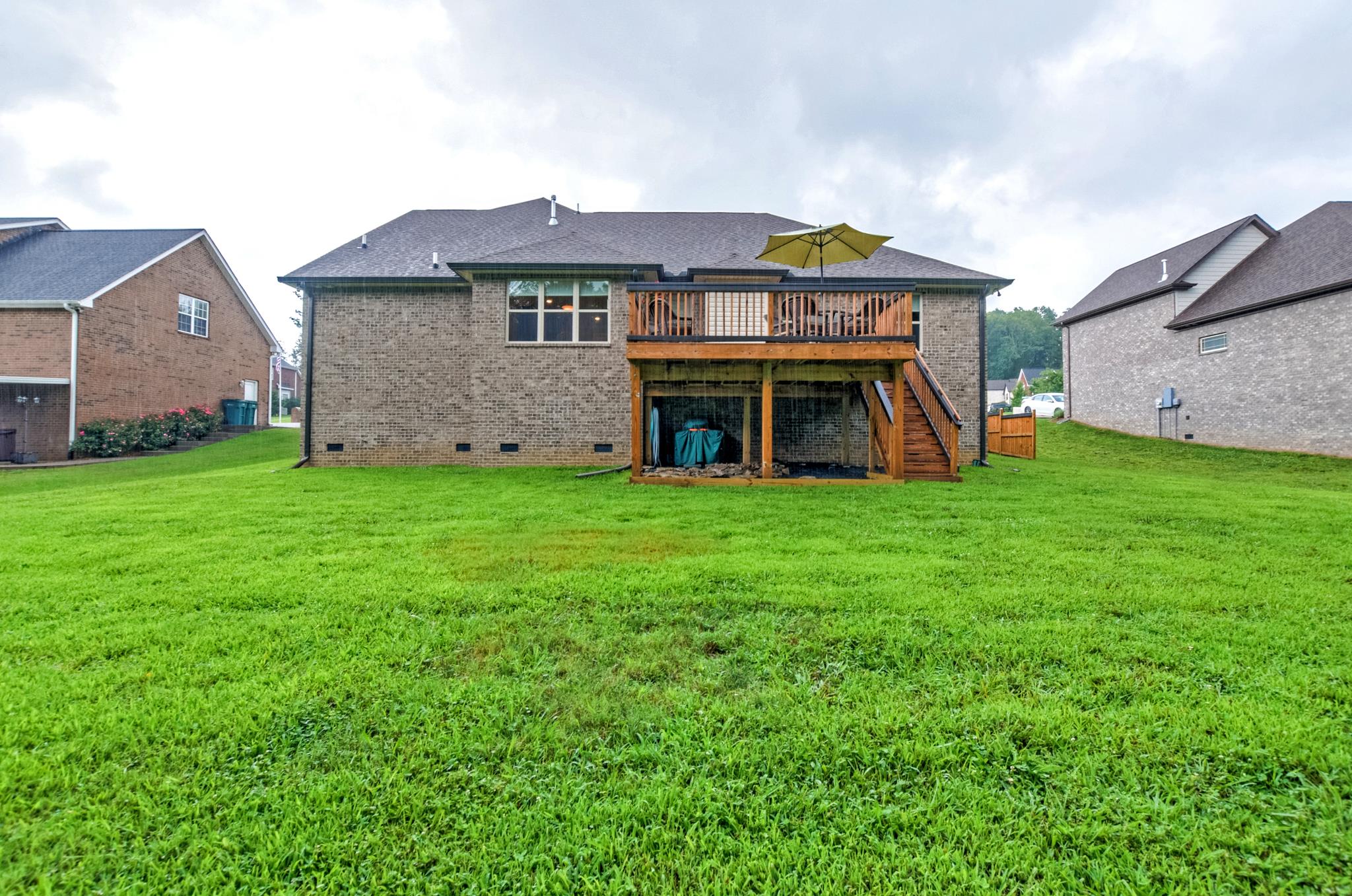 158 Abbey Road Lebanon, TN 37090 - Photo 29 of 30 a front view of a house with a garden and deck
