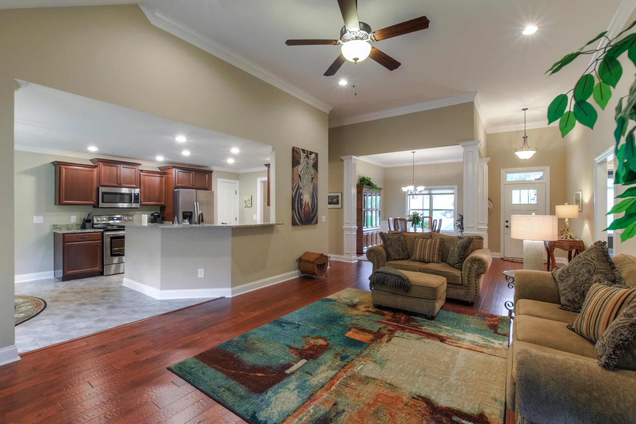 158 Abbey Road Lebanon, TN 37090 - Photo 6 of 30 a living room with furniture kitchen view and a wooden floor