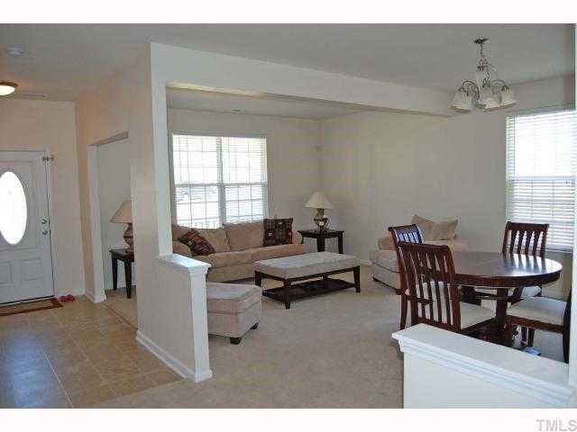 2893 Orchard Trace Way Raleigh, NC 27610 - Photo 3 of 10 The living/dining combo is apart from the kitchen/family space. No "picking up" when the doorbell rings!