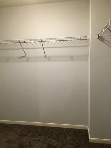 a view of a room with racks on the wall