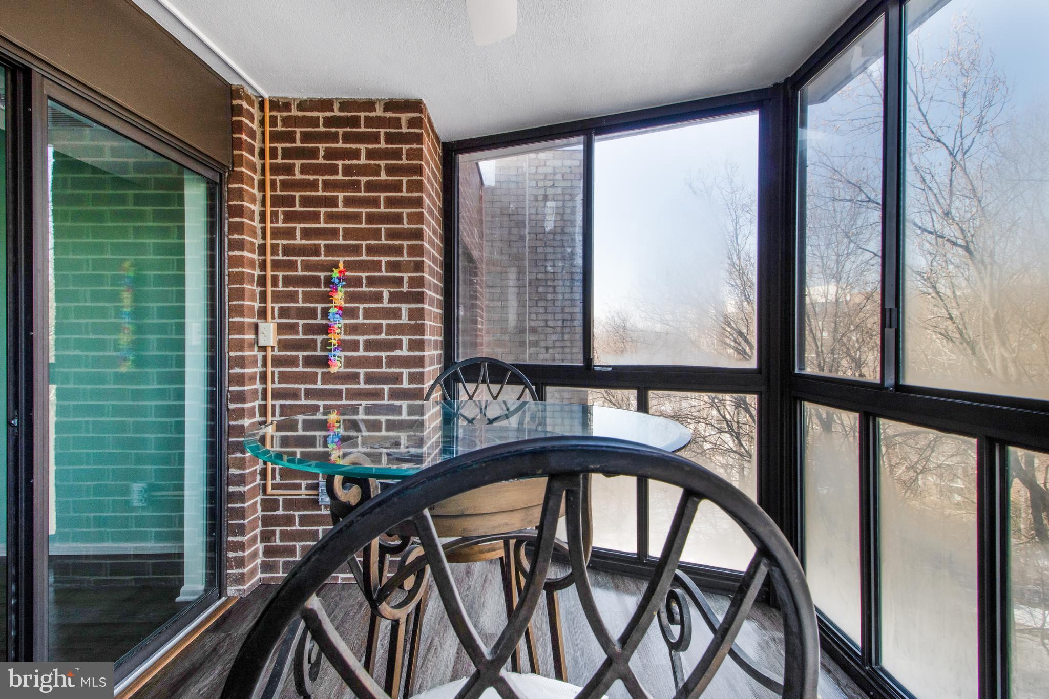 15115 Interlachen Drive, Unit 31020 Silver Spring, MD 20906 - Photo 20 of 48 a view of a balcony with an outdoor space