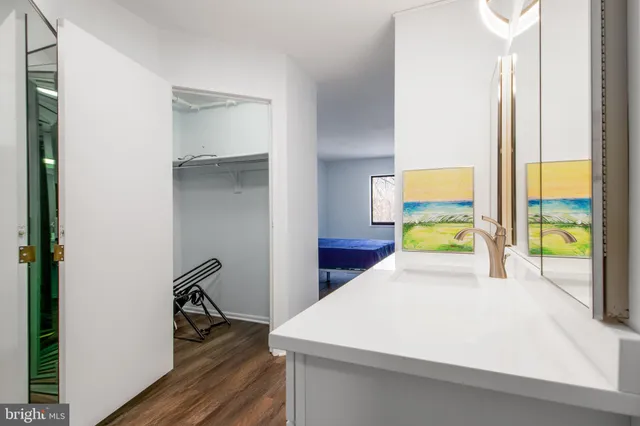 a bed room with a bed and a window