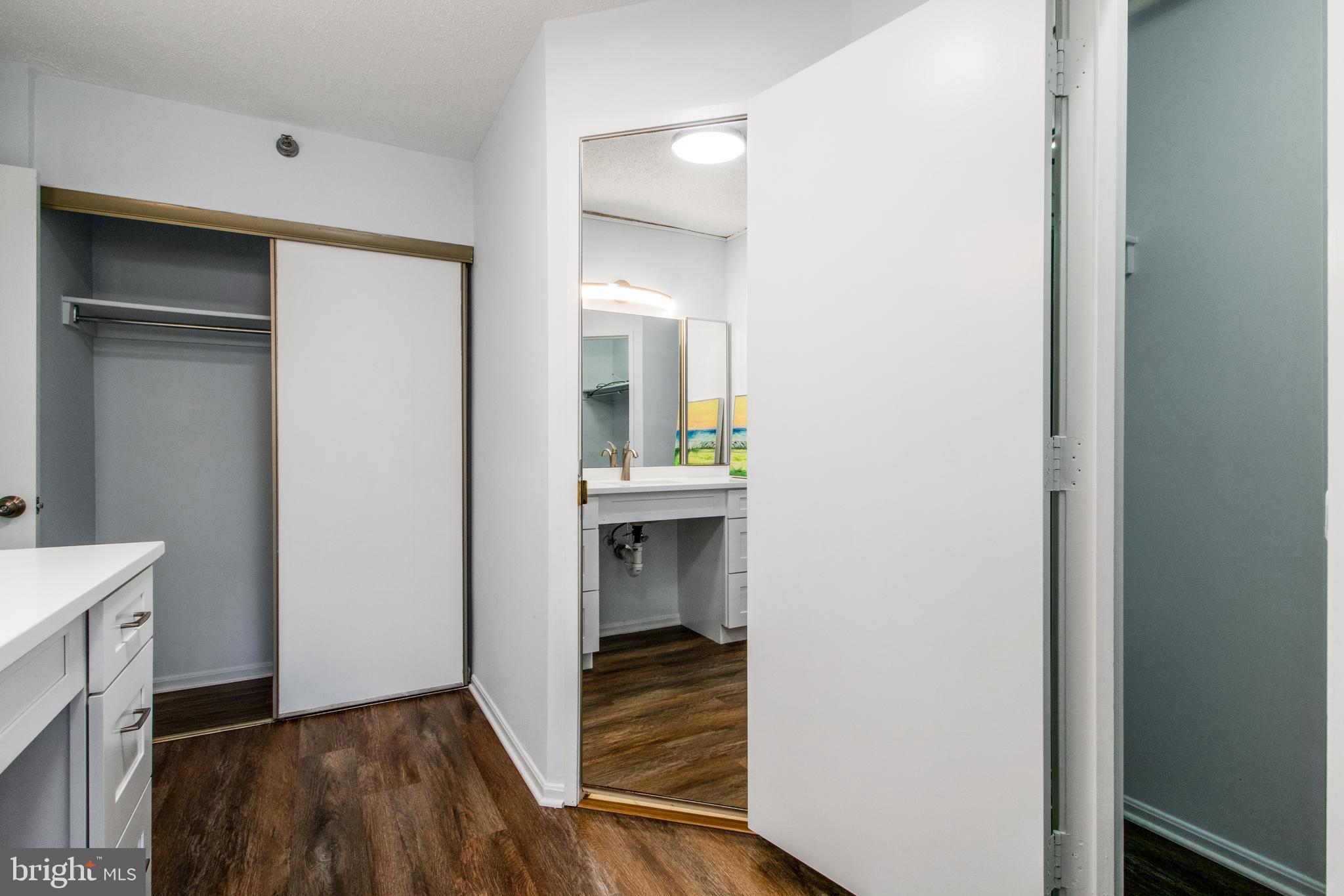 15115 Interlachen Drive, Unit 31020 Silver Spring, MD 20906 - Photo 29 of 48 a view of hallway with wooden floor