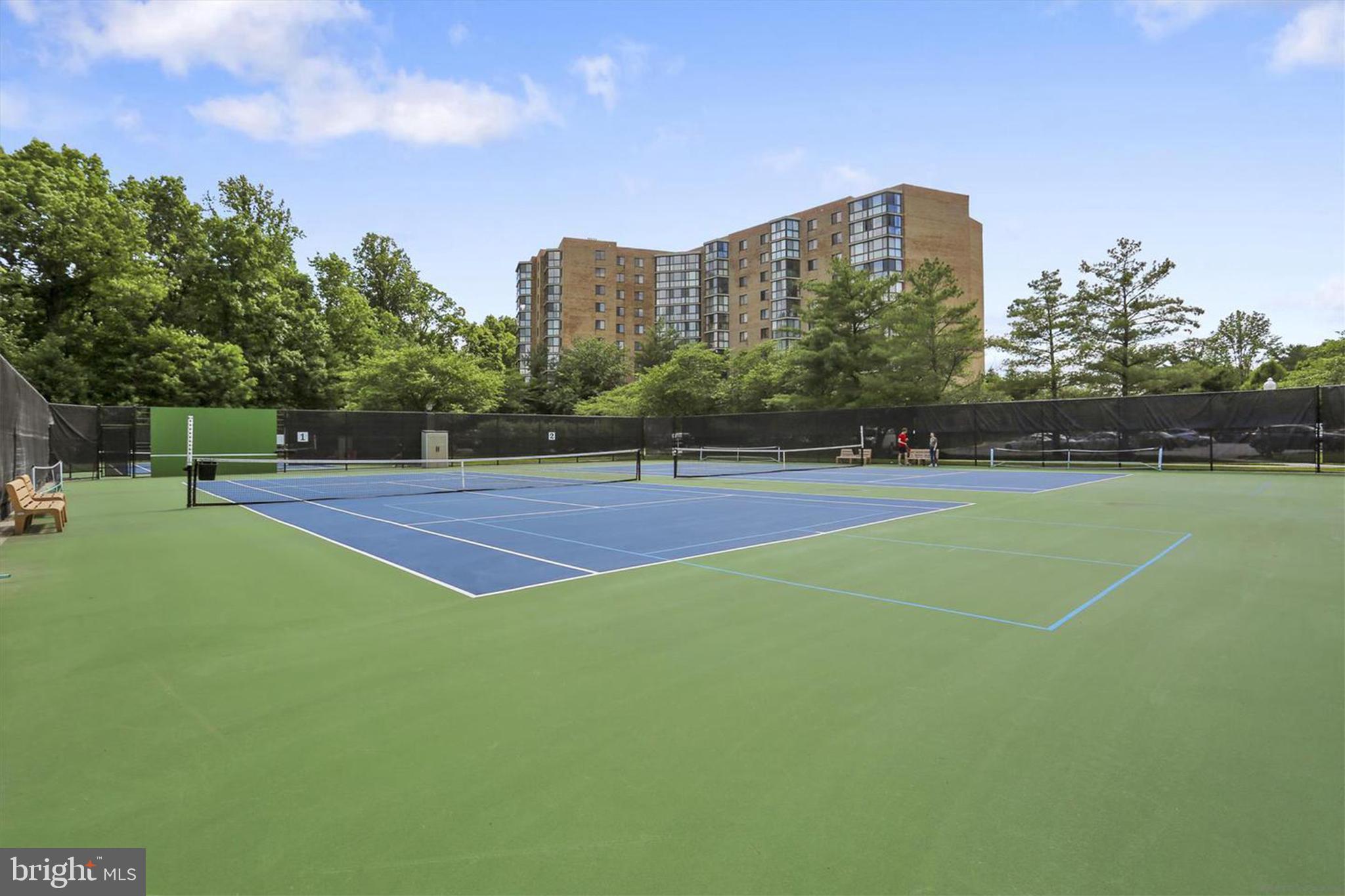 15115 Interlachen Drive, Unit 31020 Silver Spring, MD 20906 - Photo 43 of 48 a view of a tennis court