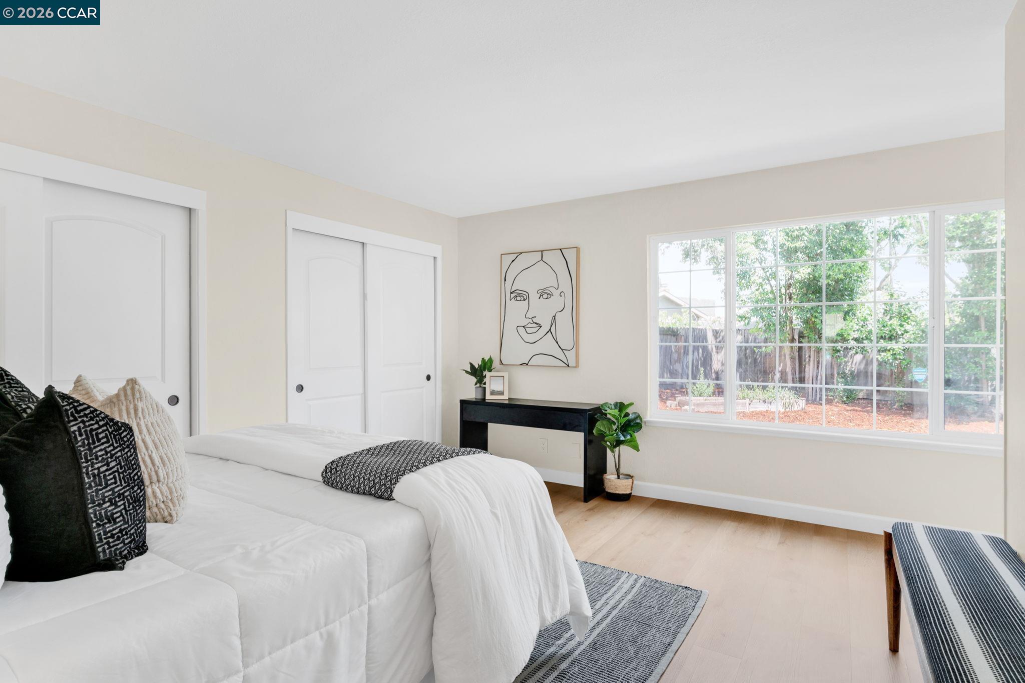 32 Yale Court San Ramon, CA 94583 - Photo 20 of 40 a bedroom with a bed and a large window