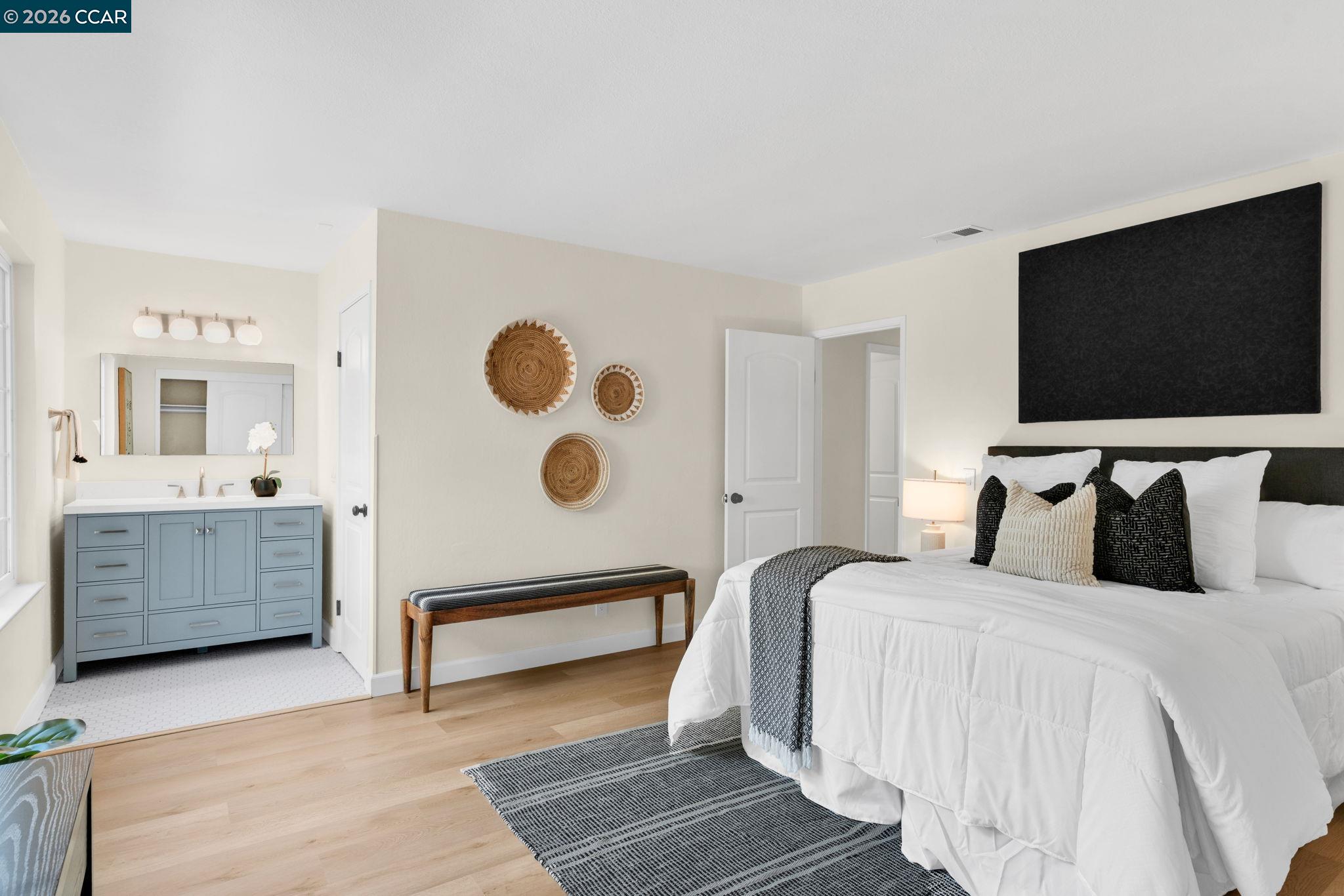 32 Yale Court San Ramon, CA 94583 - Photo 21 of 40 a bedroom with double bed and a flat screen tv