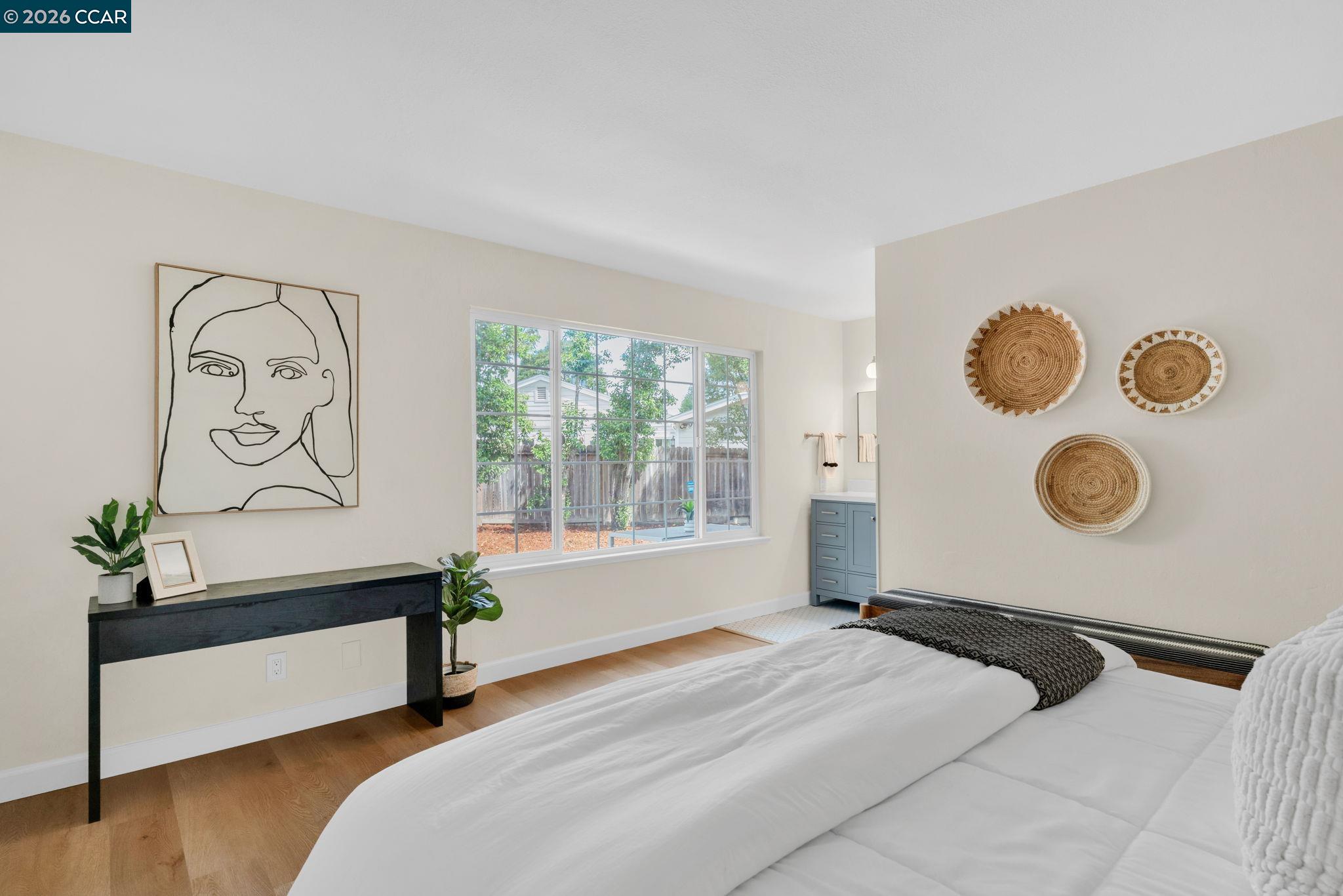 32 Yale Court San Ramon, CA 94583 - Photo 22 of 40 a bedroom with a bed and a window