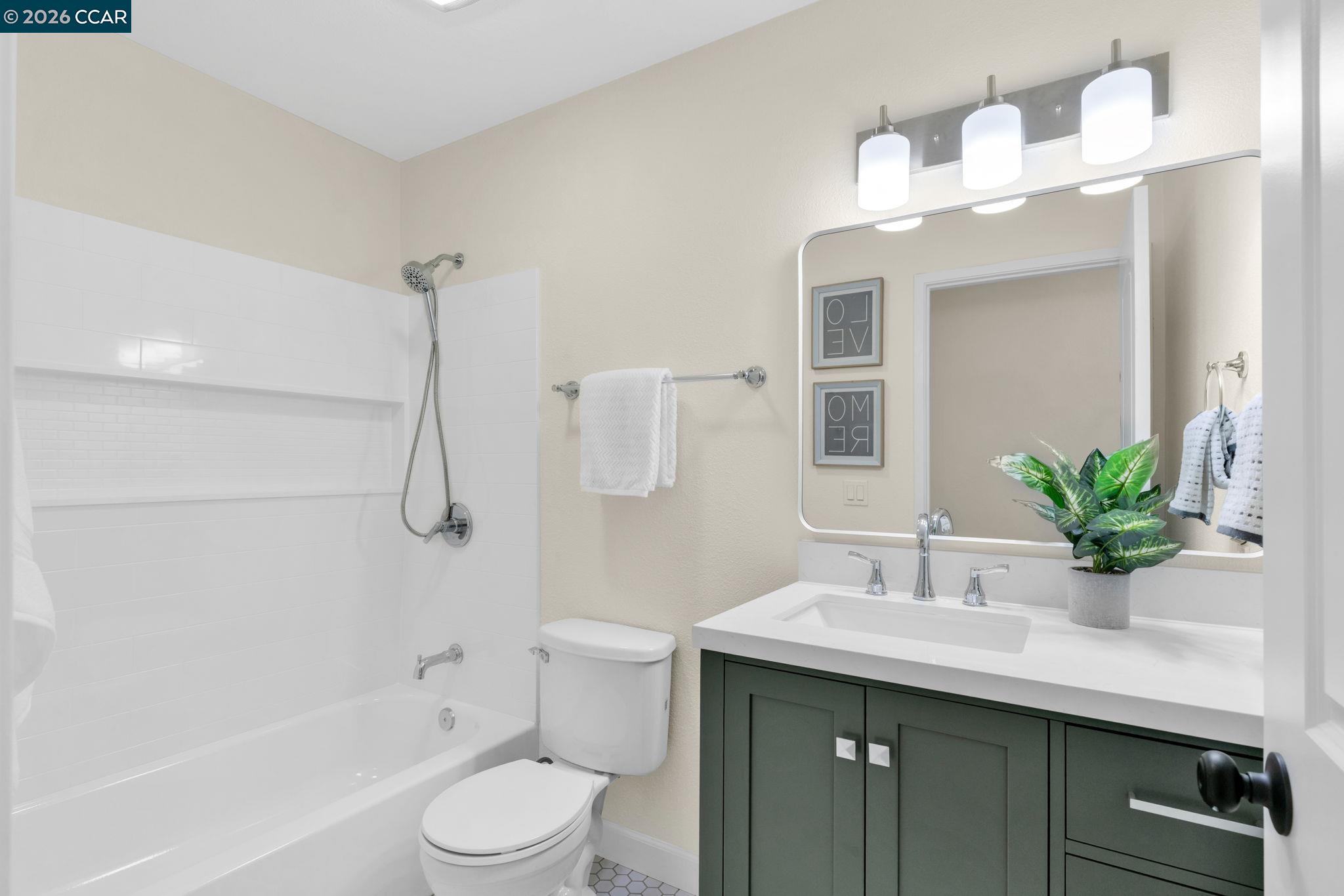 32 Yale Court San Ramon, CA 94583 - Photo 27 of 40 a bathroom with a sink a toilet and shower