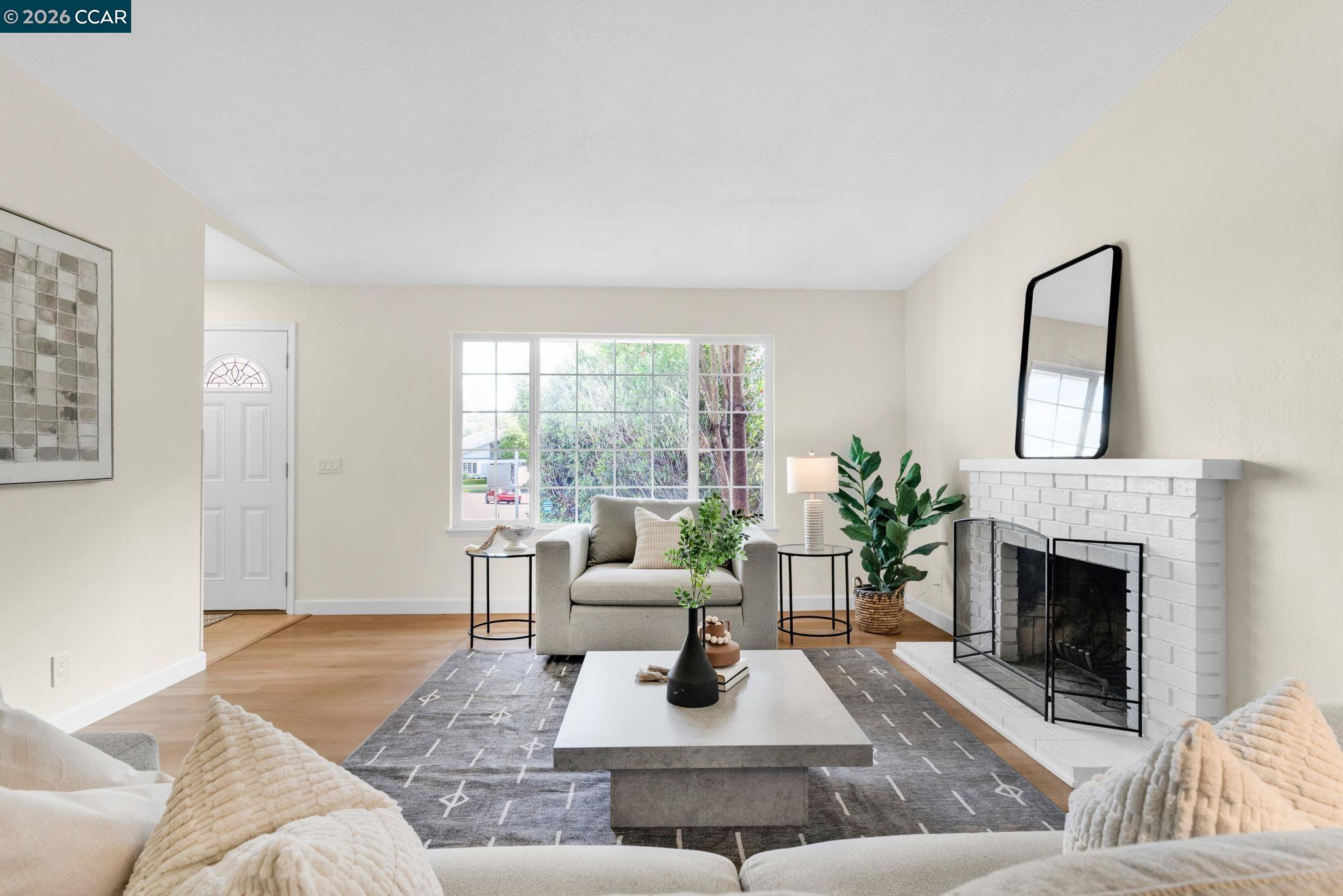 32 Yale Court San Ramon, CA 94583 - Photo 3 of 40 a living room with furniture and a fireplace