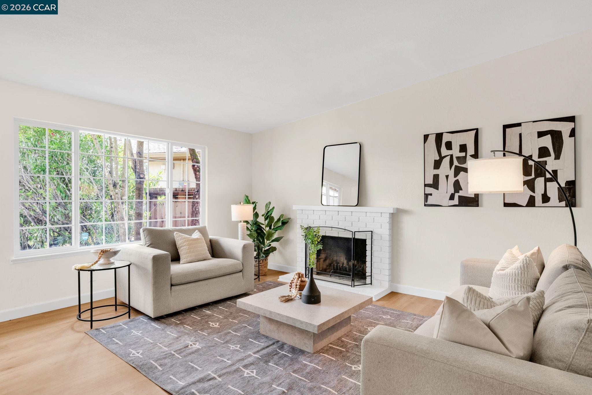 32 Yale Court San Ramon, CA 94583 - Photo 4 of 40 a living room with furniture fireplace and a large window