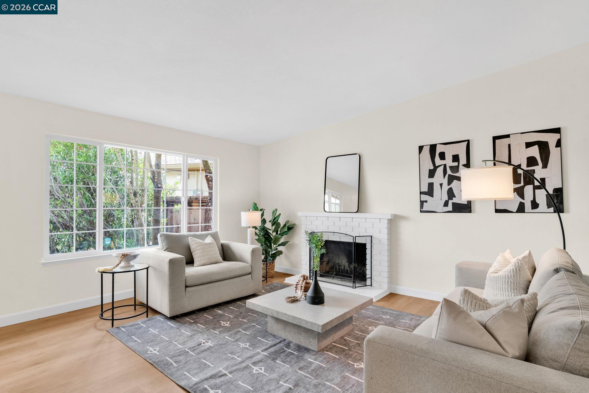32 Yale Court San Ramon, CA 94583 - Photo 5 of 40 a living room with furniture and a fireplace